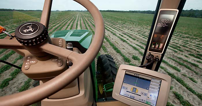 tractor showing computer equipment for row crops