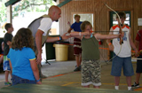archery lessons at 4-H camp