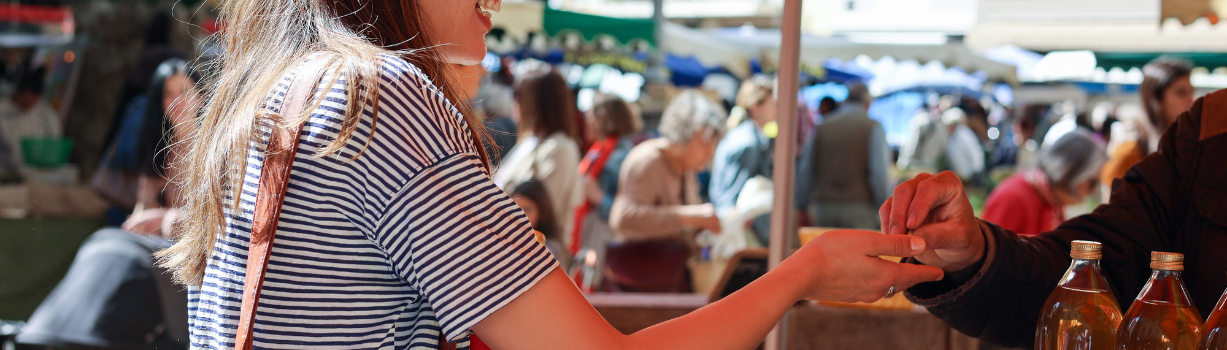 Image of someone handing someone else something