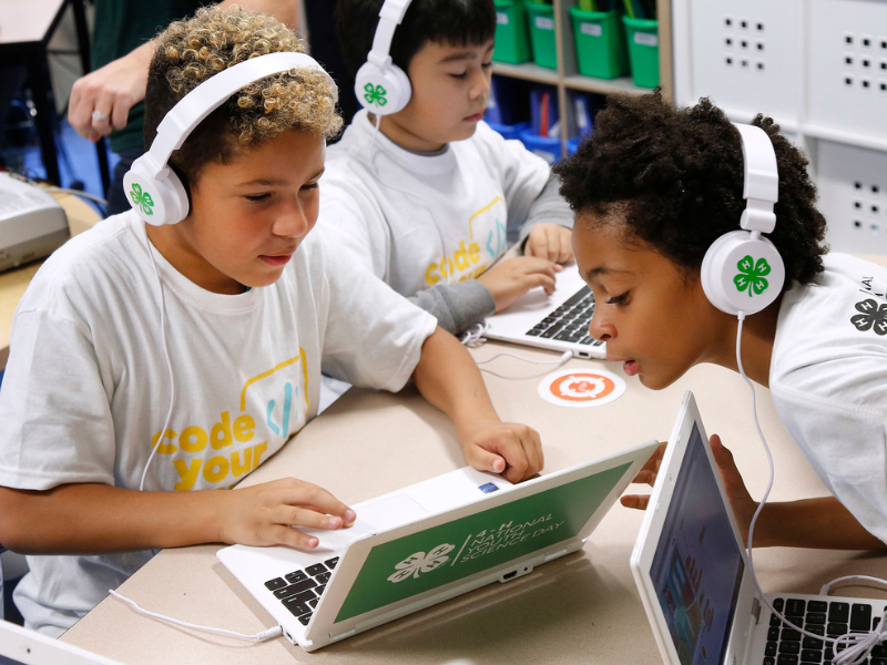 kids looking at a computer