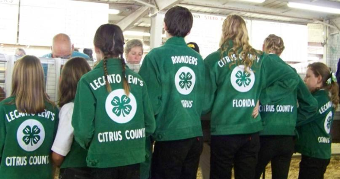 4-H youth with green jackets