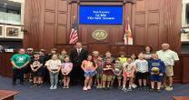 Lafayette 4H Summer Camp participants standing inside the capital with Ledge Week participants