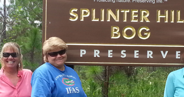 Ladies standing in front of Splinter Hill Bog sign