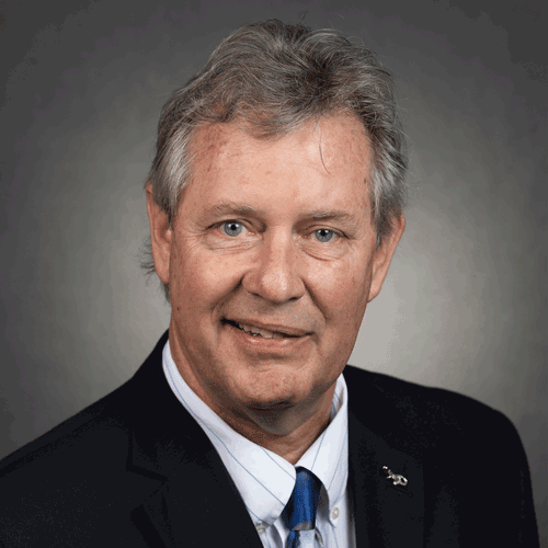 Headshot of Ronald W. Rice (Ron) smiling for official portrait.