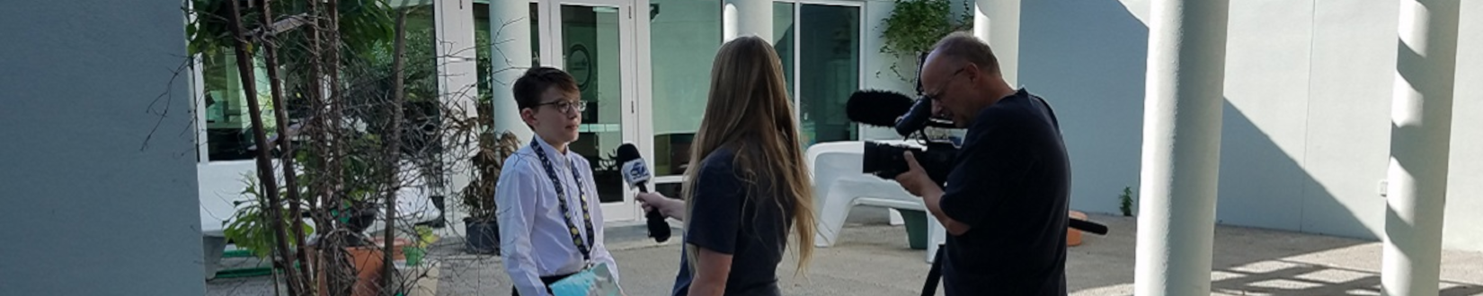 a member of sarasota county extension's 4-h program is interviewed by a local television outlet. [credit: uf/ifas extension sarasota county]