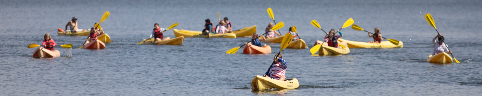 4-H youth participate in a rowing activity at Camp Cloverleaf in Lake Placid. [credit: uf/ifas]