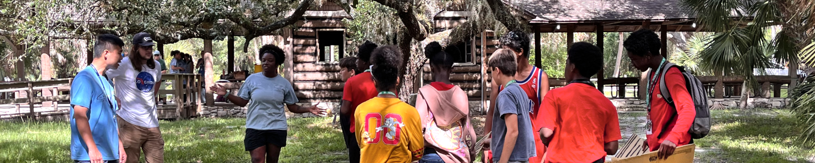 sarasota county extension staff members and 4-h youth interact during a summer camp activity (2024). [credit: uf/ifas extension sarasota county]