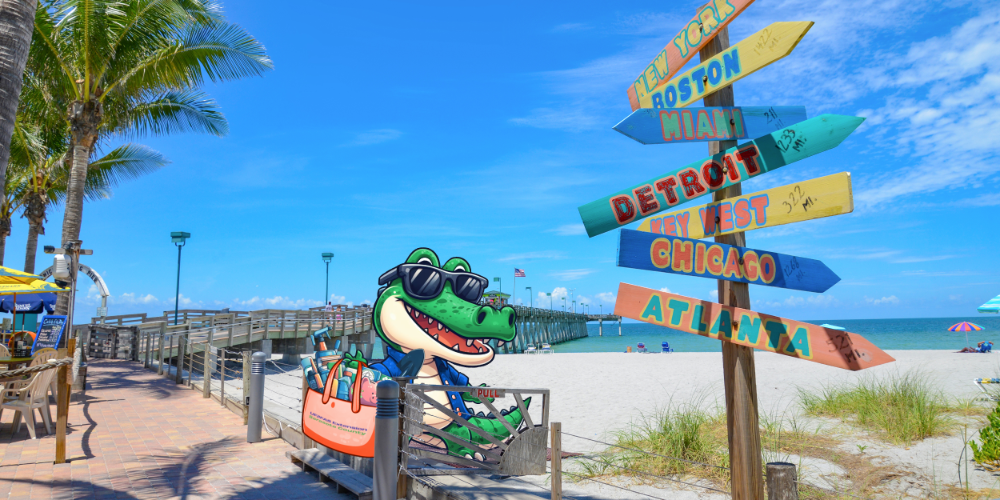 photo-illustration with cartoon alligator icon carrying a uf/ifas extension sarasota county tote bag packed with new resident items, passing a direction sign while walking onto a beach
