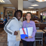 a 4-h club member poses with sarasota county extension's 4-h agent. [credit: uf/ifas extension sarasota county]