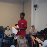 a youth showcases communication skills during a sarasota county extension's 4-h event. [credit: uf/ifas extension sarasota county]