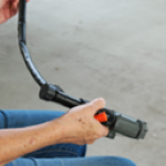 closeup of a participant checking irrigation equipment during a sarasota county extension training event. [credit: uf/ifas extension sarasota county]