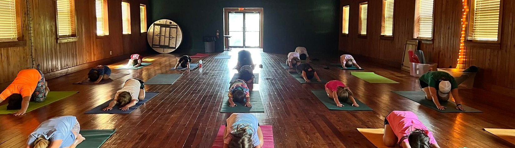 4-H Kids learning yoga at camp