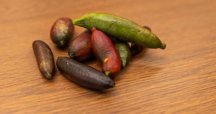 fingerling limes on wood