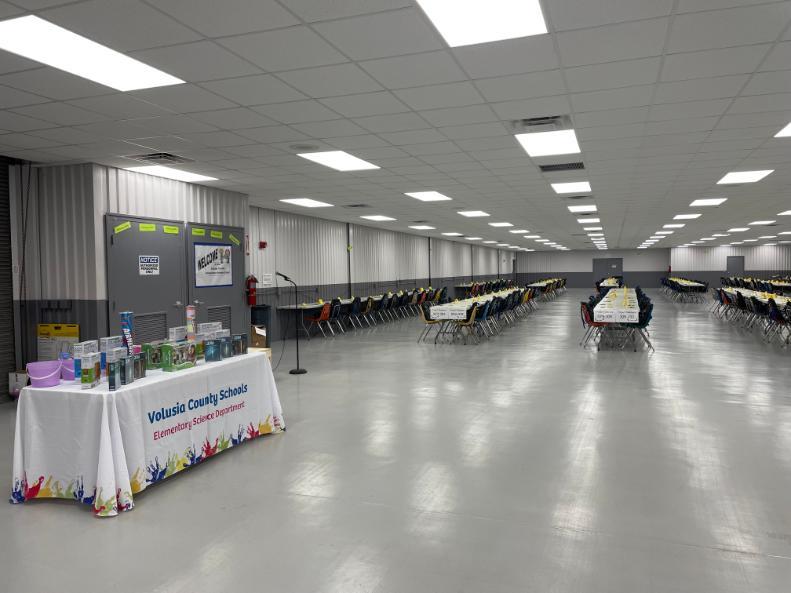 Photo of the tables and chairs set up in the building