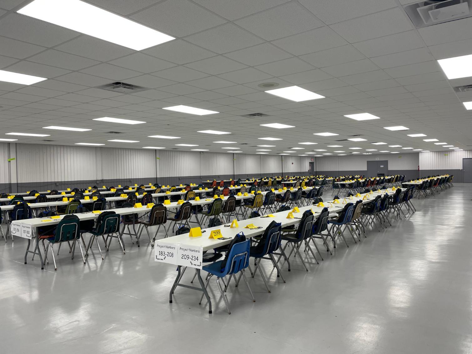 Photo of the tables and chairs set up in the building