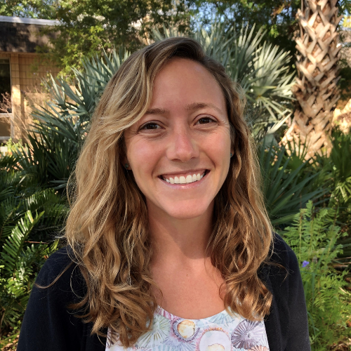 Pic of a person with trees behind them